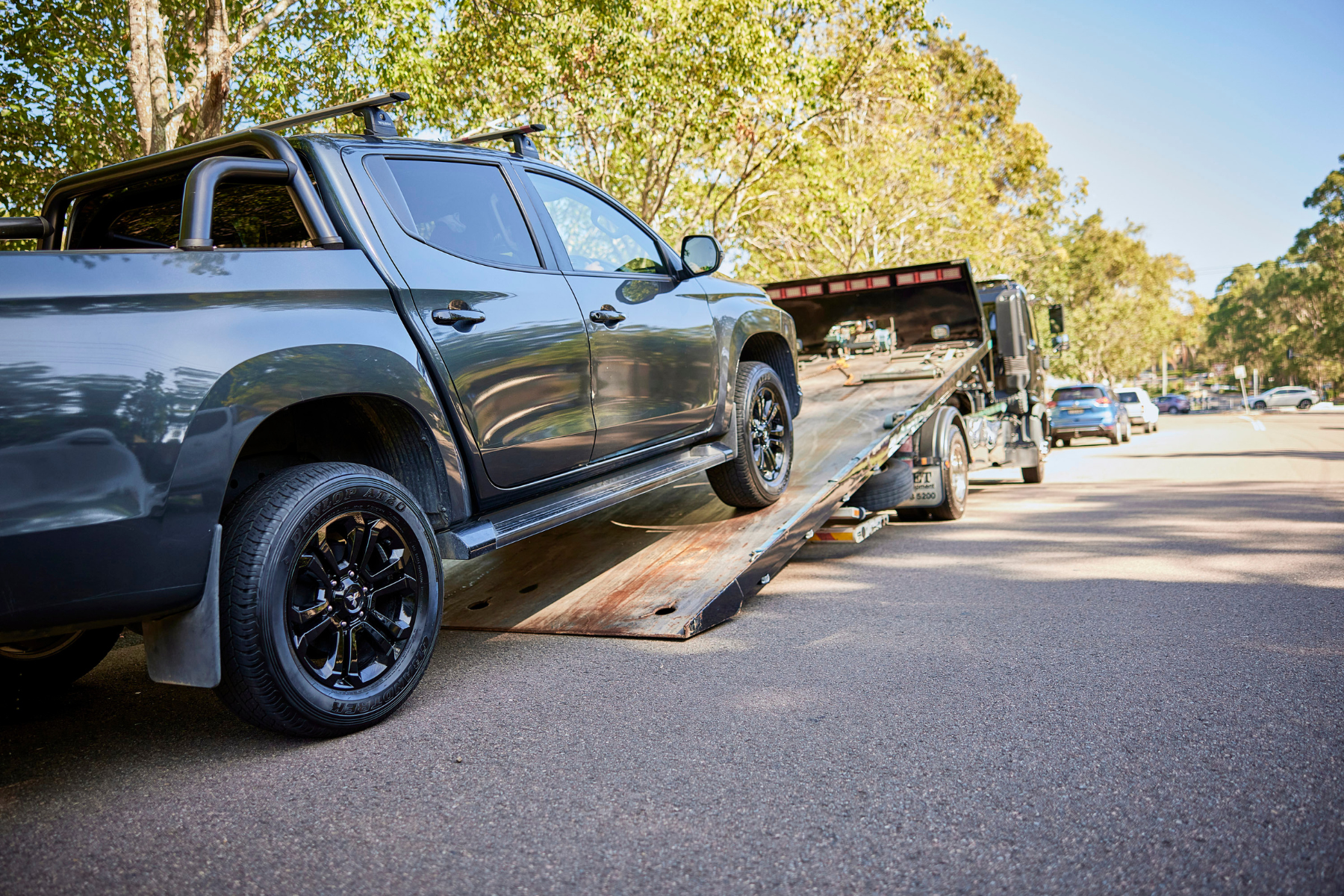 car being loaded onto a trailer for car transportation in New Zealand