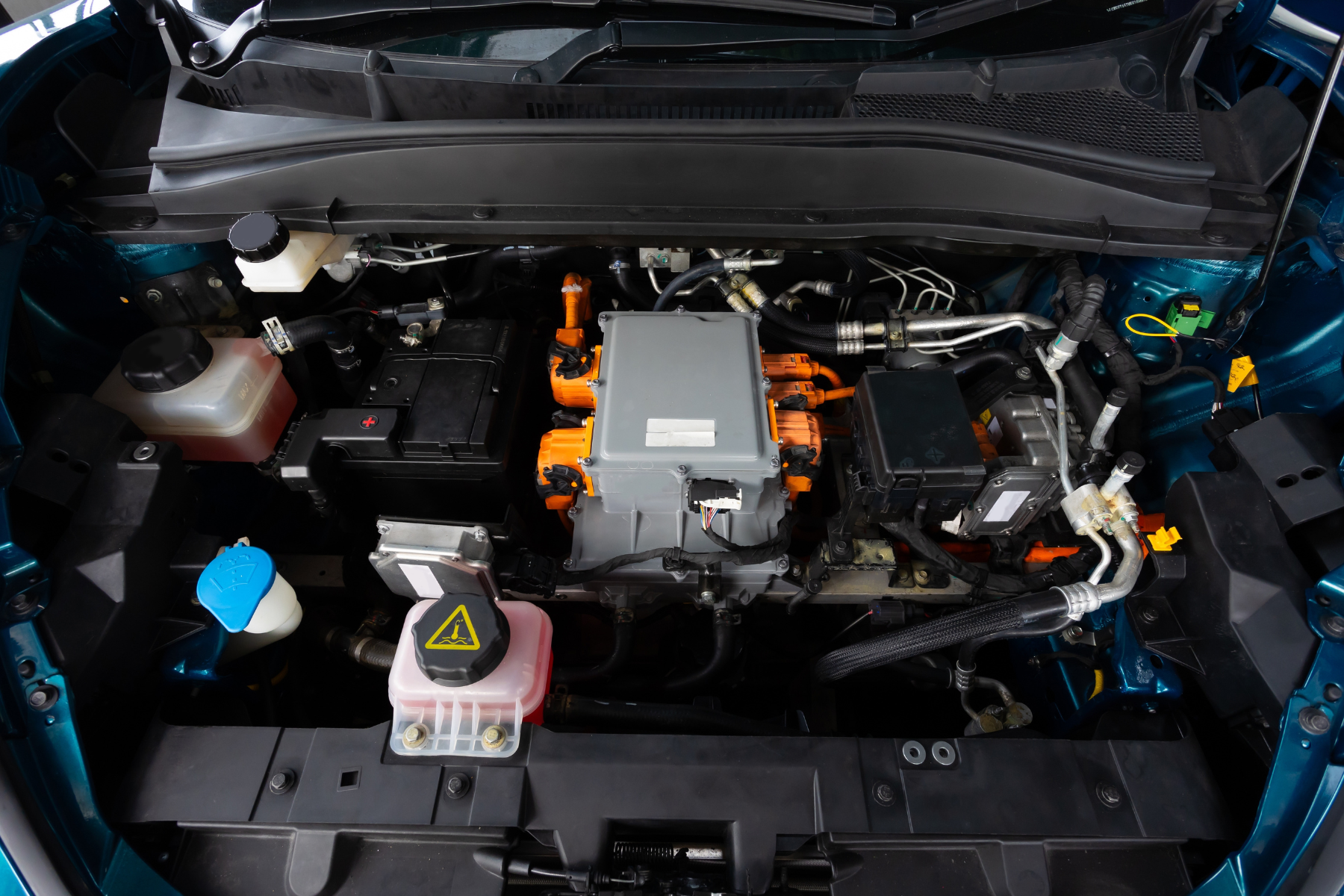 Electric car engine under hood. electric vehicle high power and environment. Battery pack in EV electronic car.