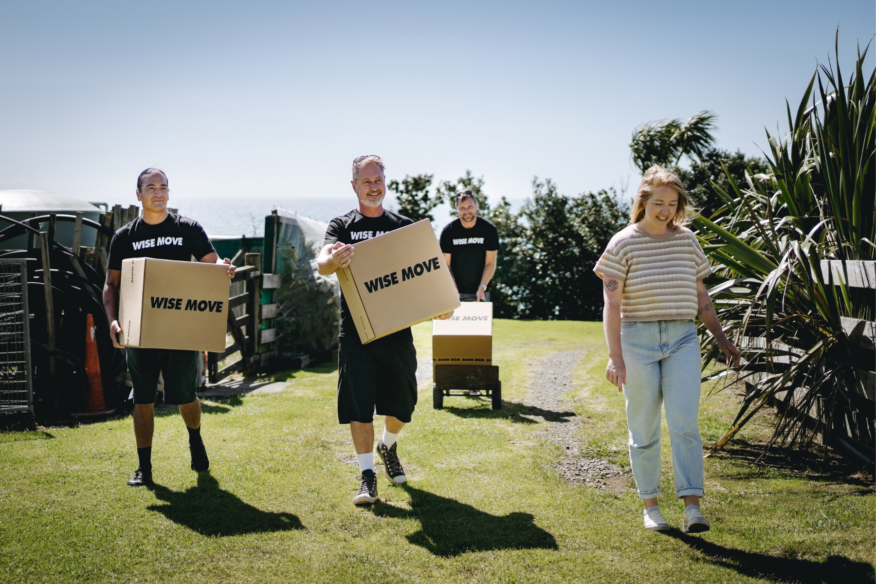 Student movers carrying a student's boxes in a student move