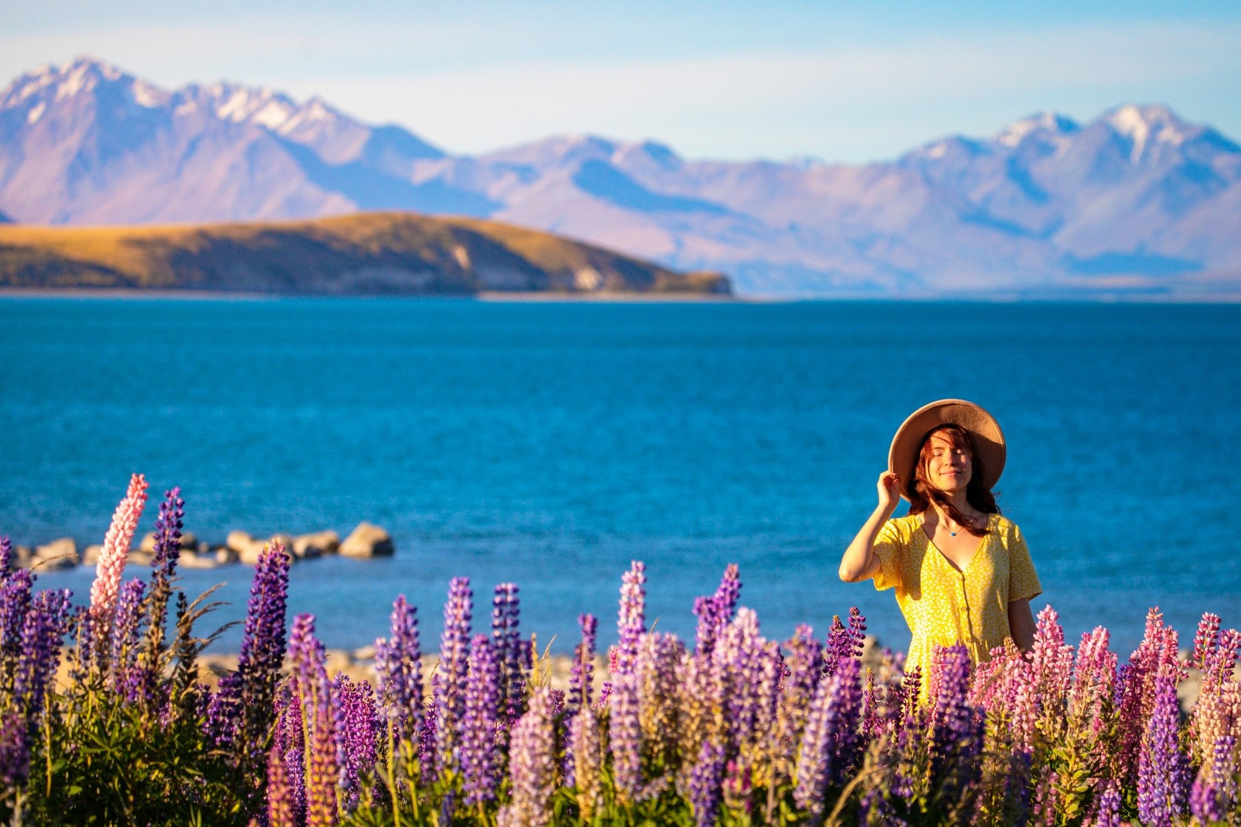 Women enjoying spring blossoms in New Zealand
