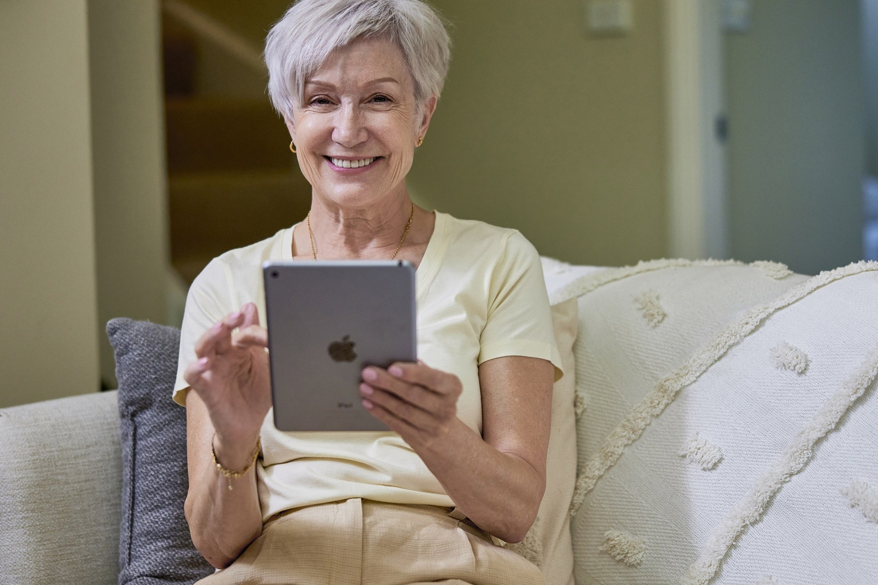 Senior lady looking at fees and contracts of retirement villages